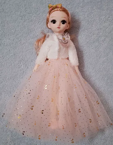 Kids favorite doll with peach color frock