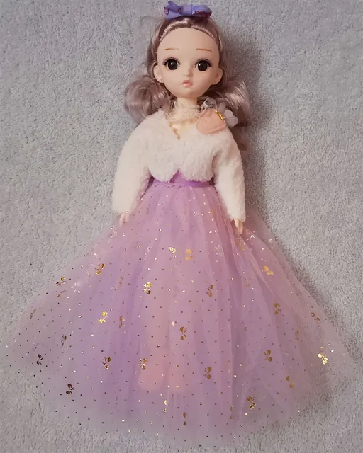 Elelgant doll in purple Outfit and with Bow