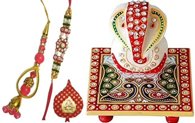 Rakhi Gift Set of 2 Designer Rakhis for Brother and Bhabhi with Chowki Ganesha and Pack of Roli Chawal in Auspicious Red Paan Packing