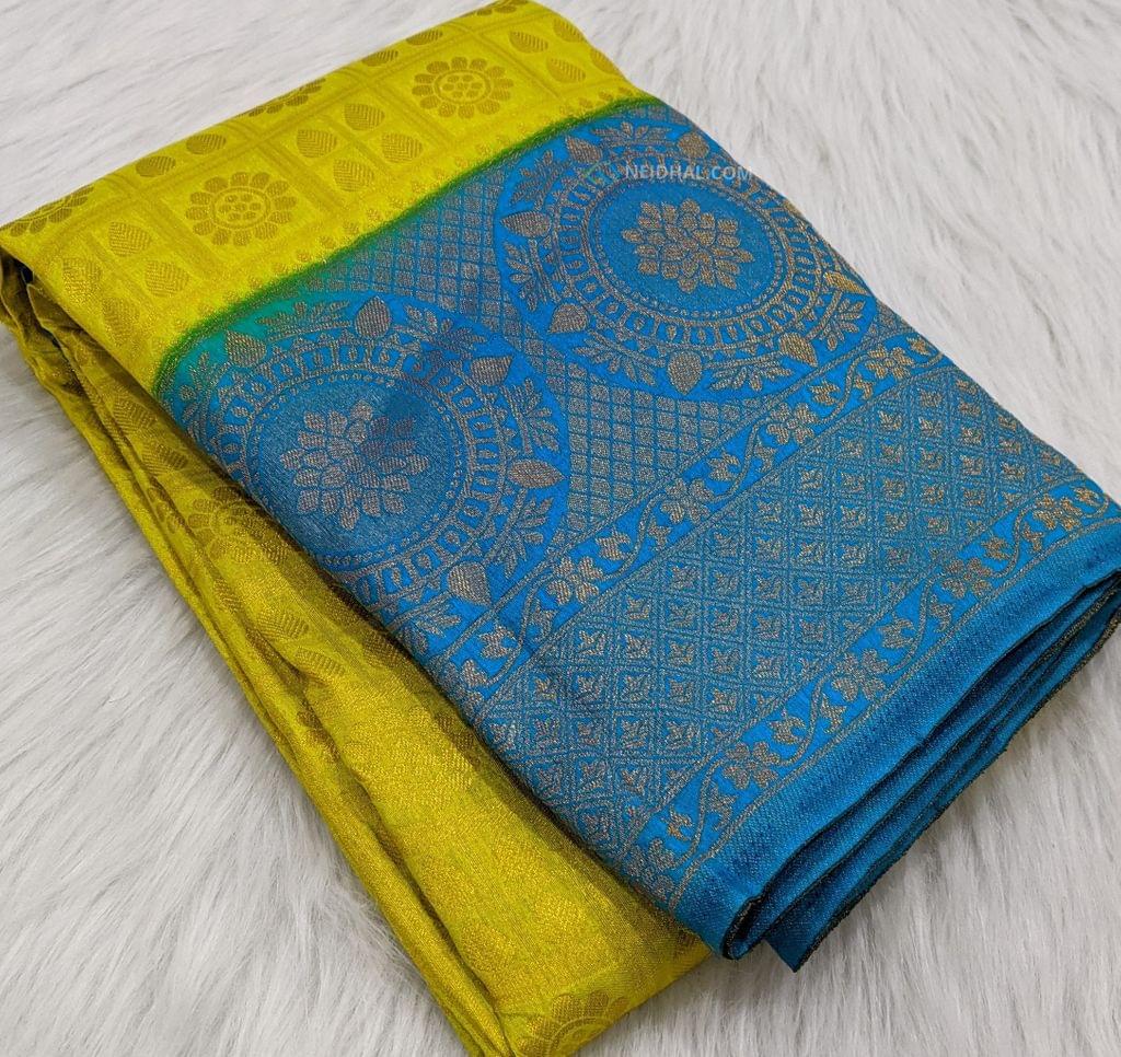 CODE:WS43  Yellow with a tint of green soft fancy silk saree with checked patterns and buttas all over ,contrast blue zari woven double side borders(9 inches one side 4 inches other side ),antique zari woven pallu and zari woven soft brocade blouse