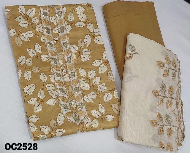 CODE OC2528 : Leaf Printed Sand Brown Satin Cotton unstitched Salwar material (lining included) with embroidery and sequence, buttons on yoke,  matching cotton provided, which can be used as lining or bottom,, embroidery and sequence work on silk cotton dupatta with cut work edges.