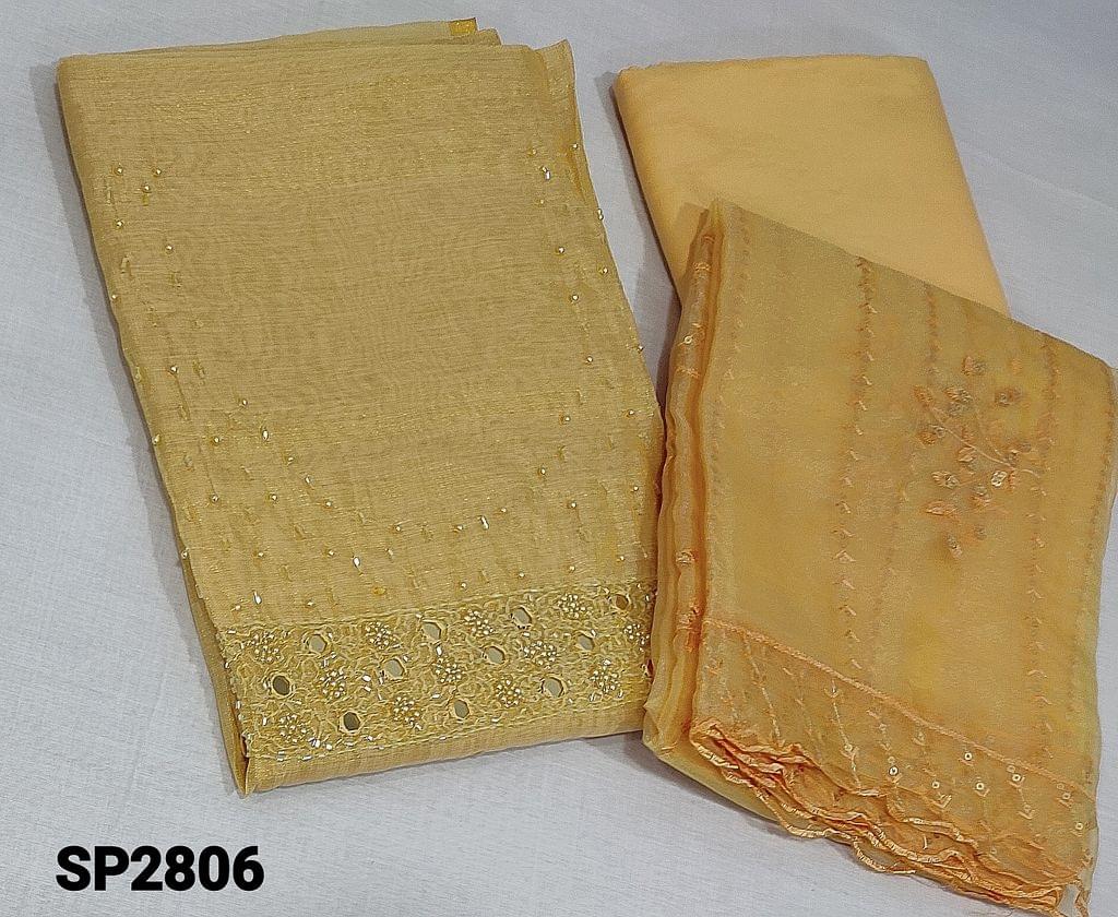 CODE SP2806: Designer Yellow and golden tint Tissue Silk Cotton unstitched Salwar material(requires lining) with cut bead, pearl bead, sugar bead and real mirror work on yoke, matching silky bottom, embroidery and sequence work on organza dupatta with cut work edges. (embroidery design might vary)