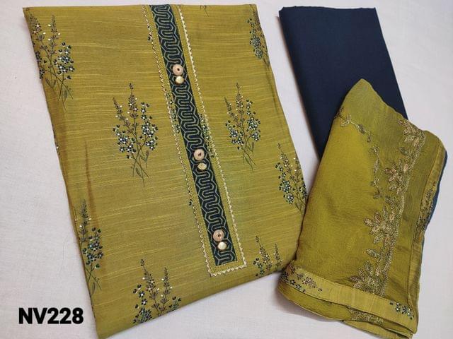 CODE NV228 : Printed  Mehandi Green Viscous Silk Unstitched Salwar material(thin and silky fabric Requires lining) with  Yoke patch work with wooden buttons, navy blue cotton bottom, Dual Shaded chiffon dupatta with zari and thread embroidery work and tapings.