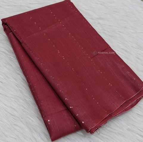 CODE WS318 : Maroon premium linen borderless saree with sequence work all-over ,thread woven design in pallu with gold zari weaving and tassels( as these are handwoven, slight inconsistencies in weaving are not to be considered as defects),plain running blouse