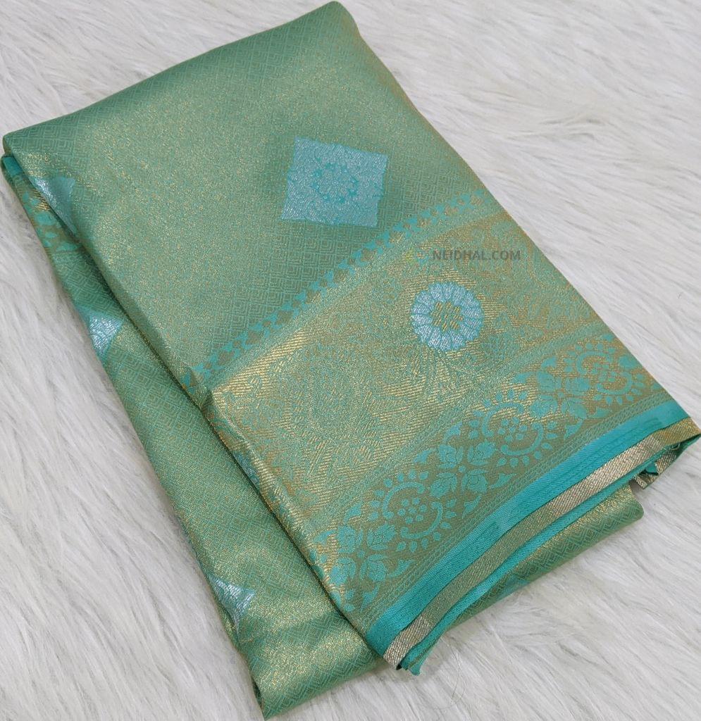 CODE WS322 : Turquoise blue soft brocade saree with gold and silver zari woven weaving pattern with self-borders,rich  brocade pallu and soft running soft brocade blouse
