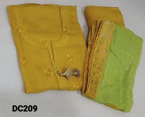 CODE DC209: Designer Yellow pure Organza Unstitched salwar material (requires lining) with embroidery and sequence work on frontside, fancy tassels on yoke, round neck, matching santoon bottom, foil work on light green chiffon dupatta with brocade tapings.