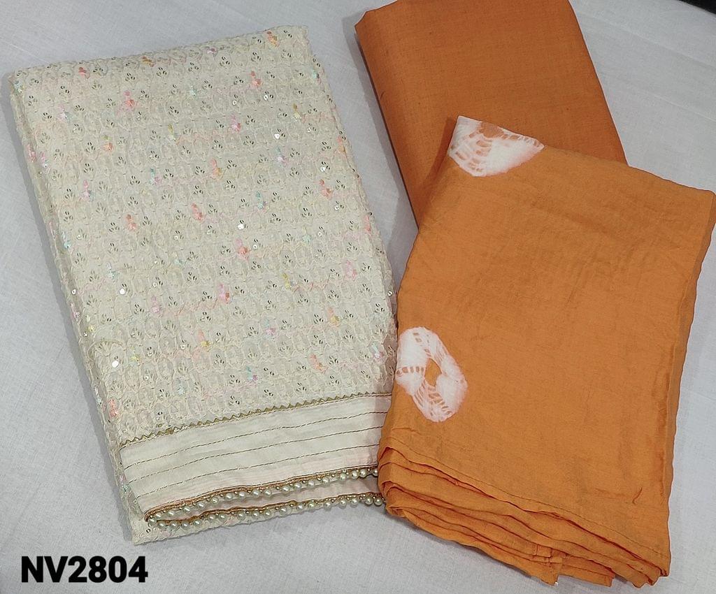 CODE NV2804: Premium Ivory fancy Silk Cotton Unstitched Salwar material(requires lining) with Heavy embroidery and sequence work on frontside, gota lace and bead tapings on daman, pastel peach cotton bottom, Shibori dyed soft silk cotton dupatta.