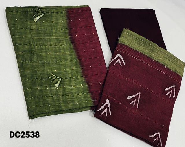 CODE DC2538 : Dual Shaded  mossy green and dark maroon soft Silk Cotton unstitched Salwar material(thin fabric,requires lining) with batik design, thread and sequence work on front side, silk cotton bottom, dual shaded soft sillk cotton dupatta with sequence work tapings needed