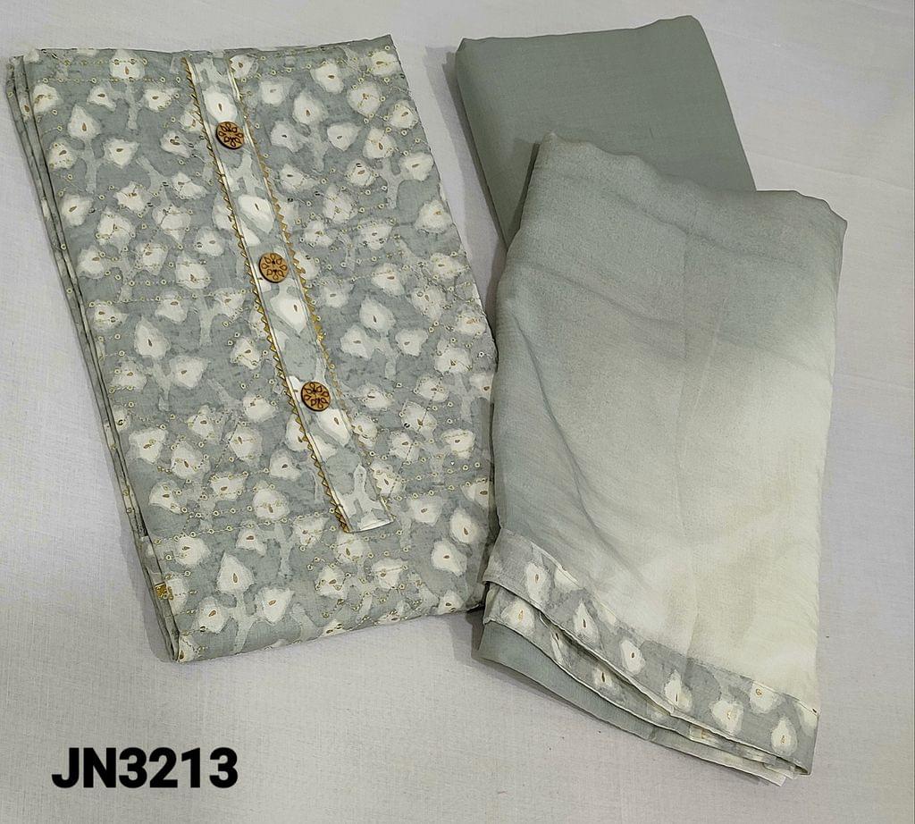 CODE JN3213: Printed Grey Cotton unstitched salwar material(soft fabric, requires lining) with thread and sequence work on frontside, wooden buttons on yoke, matching cotton bottom, dual shaded chiffon dupatta with tapings.