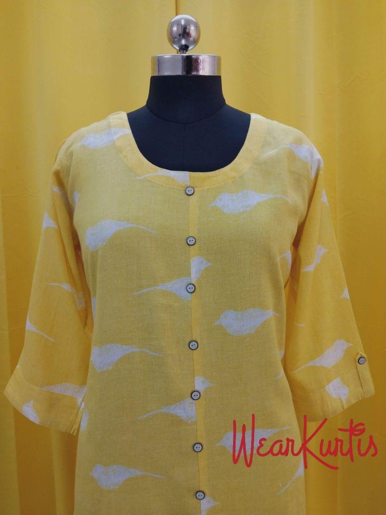 Printed Yellow Cotton Kurti with front closed placket(Refer Size chart, 3rd pic before ordering, No Refund, No Return, No exchange, No cancellation),Round Neck, Height 43, 3/4 sleeves with flaps, side slits.