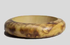 Stained wood style elegant and verity type burnt look funky and hip refined presented wood style bangle