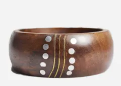 Tribal and hipster look grand chic simple presented voguish elegant and fleek type youthful wood bangle