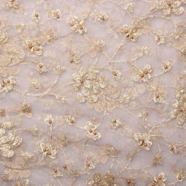 Sophisticated festal look blooming flowers sequins beads bold fabric