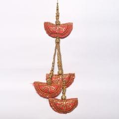 Half-moon pillow-clutch look tassels