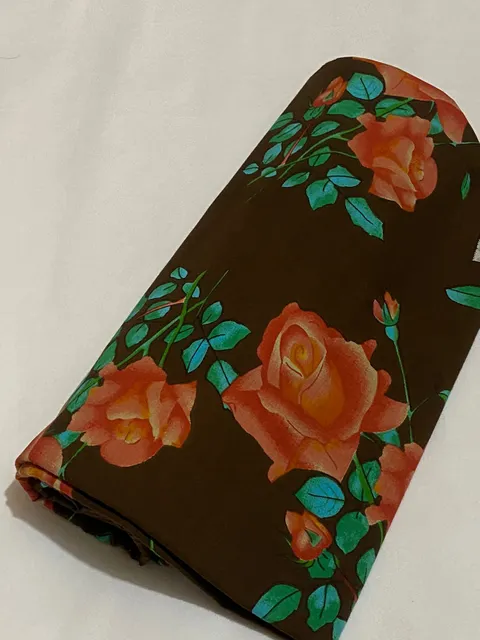 Brown colored cotton  fabric with red flowers print