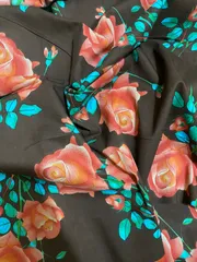 Brown colored cotton  fabric with red flowers print