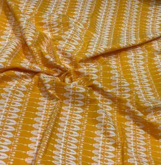 Yellow base fabric with white design