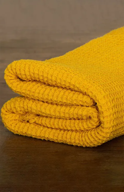 Handwoven yellow honeycomb cotton bath towel