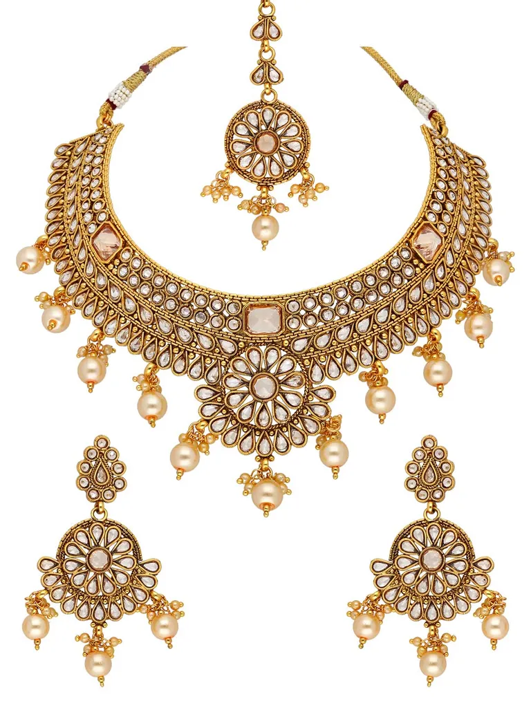 Reverse AD Necklace Set with Maang Tikka in Gold finish - AMN605