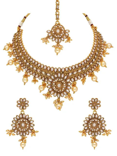Reverse AD Necklace Set with Maang Tikka in Gold finish - AMN606