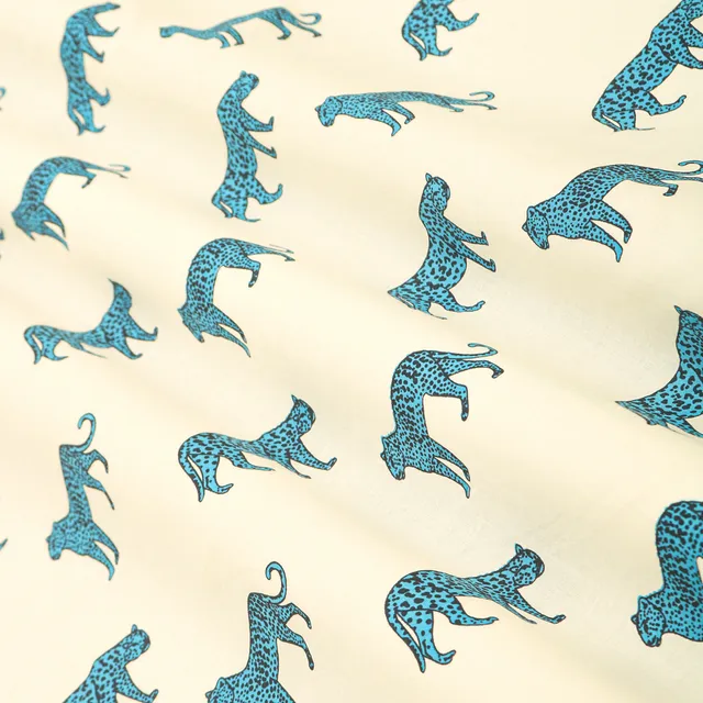 White and Blue Cheetah Motif Cotton Fabric