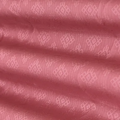 Salmon Pink Self Print Crepe Fabric