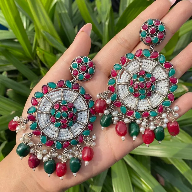 Premium stone - pearl  studded jhumkas ( Red - Green )