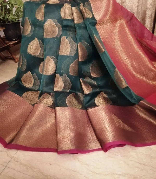 Pure Banarsi Organza Saree in Forest green with contrast Magenta and Gold Zari woven Aanchal and Border