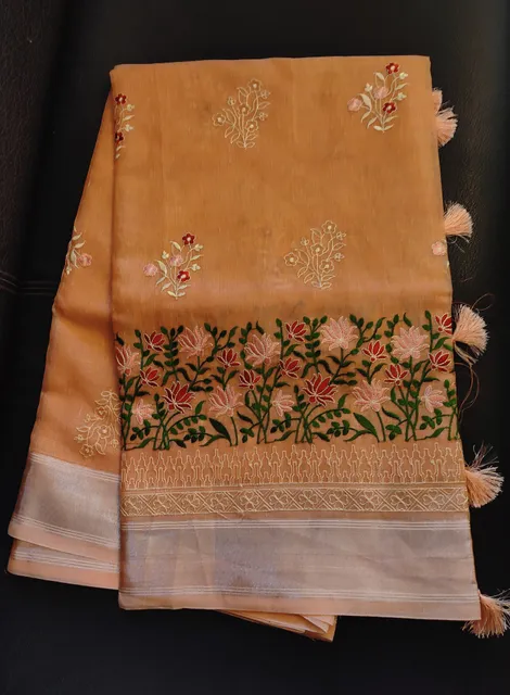 Beautiful banarsi Tissue Silk saree in Melon Orange with Lotus Hand Embroidery and Chikankari work