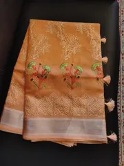 Beautiful Banarsi Tissue Silk Saree in Melon Orange with Carnation floral Hand Embroidery and Chikankari work