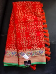 Pure Silk Beautiful Patola Bandhej Saree in Tomato Red with all over Zari Weaving
