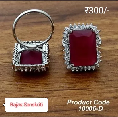 Beautiful Ring Studded with Red stone and American Diamonds on Silver Metal
