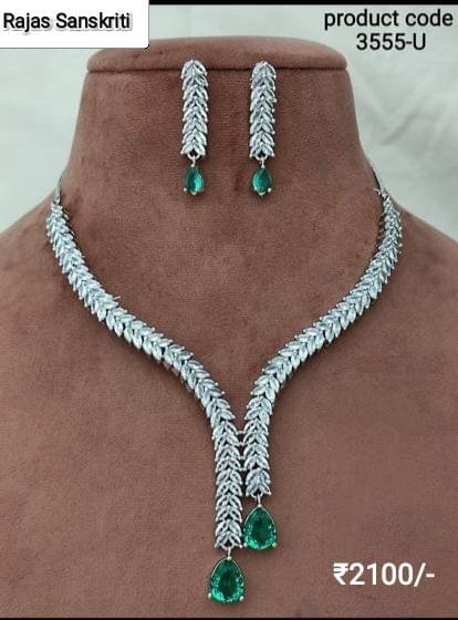 Beautiful and Elegant American Diamond Necklace Set with Tear Drop Emerald colored stone