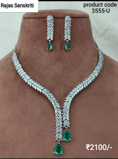 Beautiful and Elegant American Diamond Necklace Set with Tear Drop Emerald colored stone