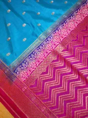 Pure Banarsi Silk Saree in Azure Blue with Rani Pink Border with Zari Butis All Over