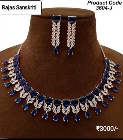 Elegant and Smart American Diamond and Blue Stone Necklace Set studded in Rose Gold
