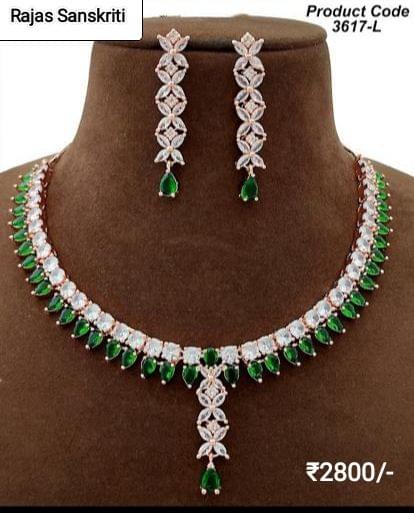 Beautiful and Elegant American Diamond Necklace Set with Emerald colored stones set in Rose Gold