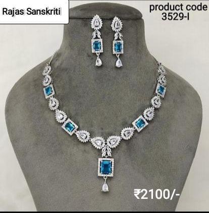 Elegant and Pretty American Diamond and Firoza Blue Stone Set studded in Silver Metal