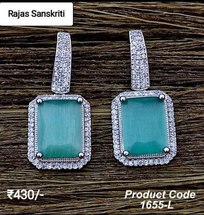 American Diamond Earrings with Emerald Green Stone studded in Silver Metal