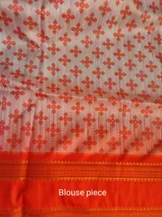 Pure Kanjivaram Silk Saree in a beautiful combination of Cream and Tomato Red