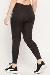 Clovia Snug Fit Active High-Rise Ankle-Length Colourblock Tights in Black - Quick-Dry