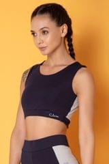 Clovia Comfort-Fit Active Colourblock Active Crop Top in Navy with Cut-Out Detail on Back - Quick-Dry