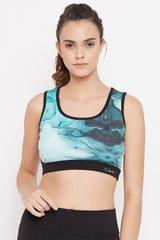 Clovia Medium Impact Padded Marble Print T-shirt Sports Bra in Blue - Moisture Wicking