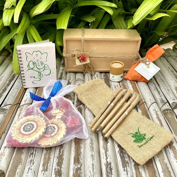 Diwali Wooden Box Hamper Plantable Mini Notepad + Diwali Themed Chocolates + 2 Seed Balls + 5 Plantable Pens