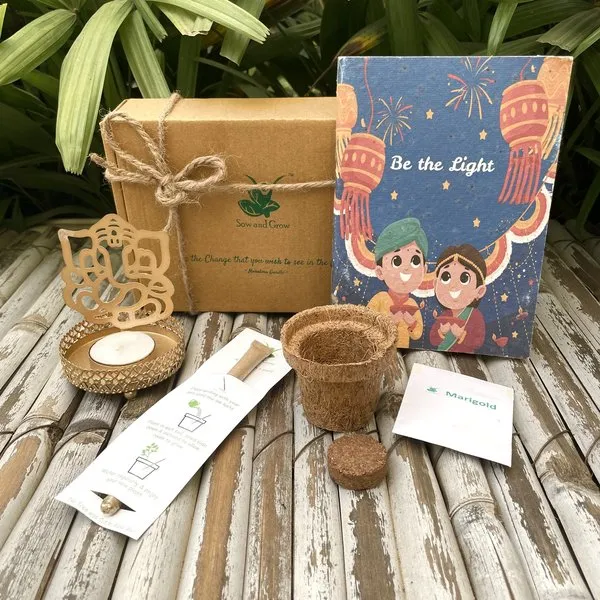 Ecofriendly Assorted Hamper Plantable Diwali Themed Diary + Seed Pen + Mini Grow Kit of Marigold + Ganesha Shadow Tealight Holder