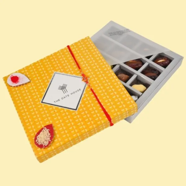 Sunshine Yellow 16 PCs Assorted Dates & Chocolates Rakhi Box