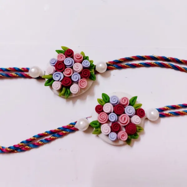 Multicolor Floral Leafy Pack Of Two Clay Rakhis