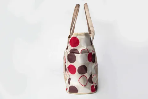 Charismomic Fashionable Polka Dotted Diaper Handbag