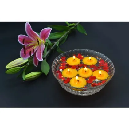 Scented Paraffin Wax Floating Candles (Flower Shape) Size: D 4.5 Cm H 1.5 Cm Colour: Golden Yellow Fragrance: Cinnaboom