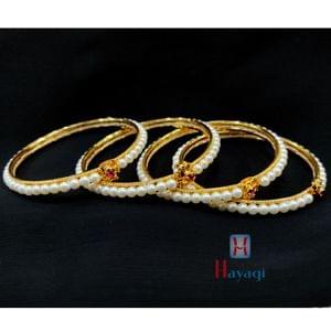 Water Pearl Bangles With Pink Stone Studded